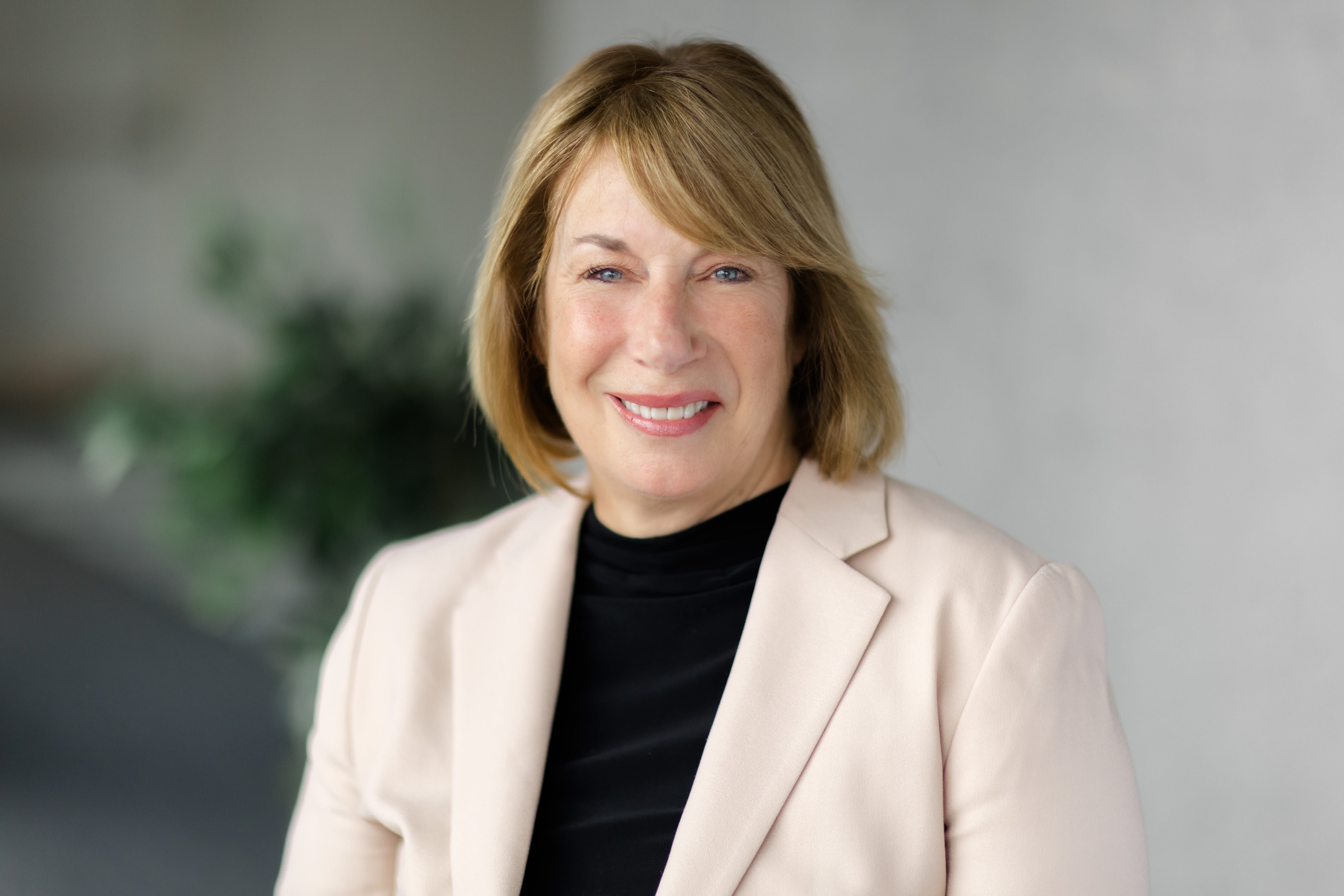 Carrie Cussons, President & CEO